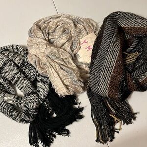 Three scarves. Black, neutral , brown colors . New